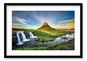 Sunset over Kirkjufellsfoss Waterfall and Kirkjufell mountain in Iceland