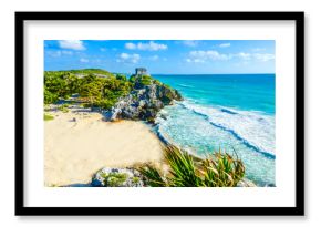 Mayan ruins of Tulum at tropical coast. God of Winds Temple at paradise beach. Mayan ruins of Tulum, Quintana Roo, Mexico.