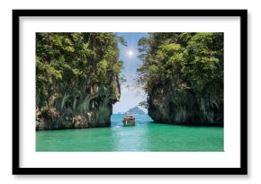 Beautiful landscape of rocks mountain and crystal clear sea with longtail boat at Phuket, Thailand. Summer, Travel, Vacation, Holiday concept.