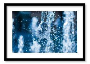 The gush of water of a fountain. Splash of water in the fountain, abstract image