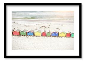 Colorful wooden houses on sand