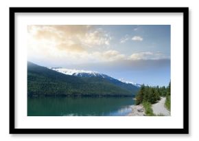 Lake and mountains against sky