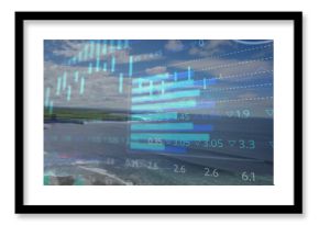 Displaying digital financial charts overlaying rocky coast, with ocean waves and marshy fields