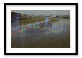 Overlaying financial candlestick chart on coastal low tide beach with shallow water and snowy hills
