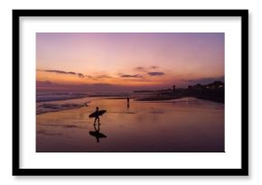 Silhouette of a people on the beach at sunset in Canggu, Bali  Indonesia