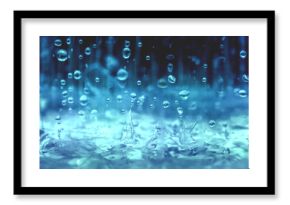 close up rain water drop falling to the floor in rainy season 