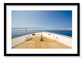 Wide angle shot of front of the yacht in summer time
