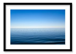 Panorama of sea waves against the blue sky