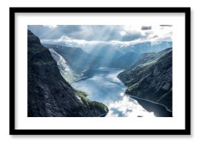 Beautiful fjord in Norway with amazing sun rays. View from the top