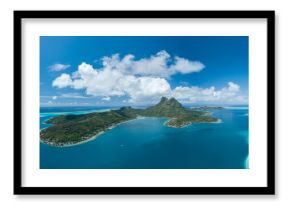 Panoramic aerial view of luxury overwater villas with palm trees, blue lagoon, white sandy beach and Otemanu mountain at Bora Bora island, Tahiti, French Polynesia (Bora Bora Aerial)