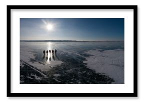 people silouette over ice from aerial view