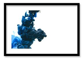 Mix of black and classic blue ink in water on an isolated white background with copy space.