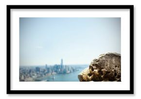 Large rock overlooking coastline city