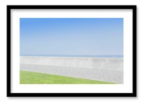 Walkway by beach against clear sky