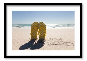 Beach holiday with 2020 in the sand