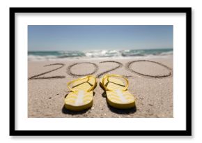 Beach holiday with 2020 in the sand