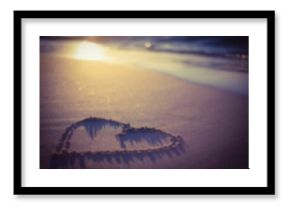 Heart shape on sand at beach