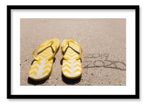 Beach holiday with 2020 in the sand