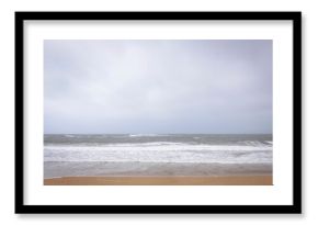 Front view of coastline on a cloudy day in the summer