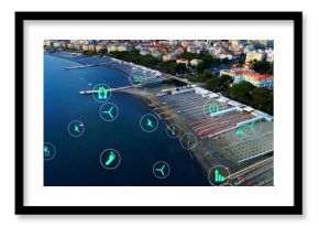 Showing beach with swimwear beachgoers on loungers under umbrellas, with energy icons, copy space