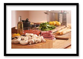 Cooking, Italian food and vegetables in kitchen on table for meal prep for dinner, supper and lunch in home. Recipe, diet and utensils on counter with ingredients for pasta, nutrition and cuisine