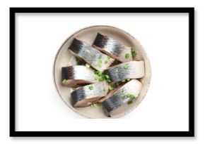Pieces of delicious herring with green onions in bowl isolated on white, top view