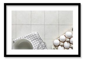 Holder with raw chicken eggs on white tile background