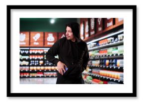 Retail Shoplifting. Man Stealing In Supermarket
