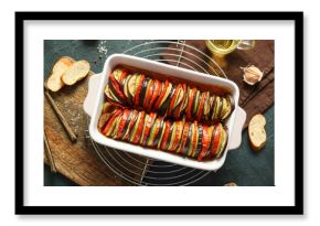 Baking dish of tasty Ratatouille on black background