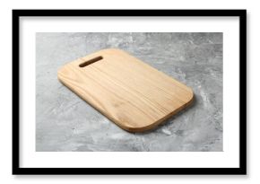 One wooden serving board on light grey textured table, closeup. Space for text