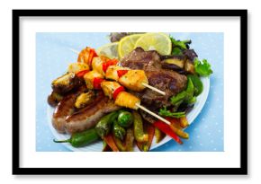 Plate of dish bulgarian cuisine meshana scara with different grilled meat and vegetables