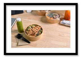 Having a lunch break at the office with delicious Healthy food delivery in take away boxes, Healthy eating concept.