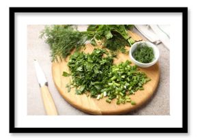 Different fresh herbs and knife on grey table, closeup
