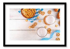 Oktoberfest greeting card background with two beer glasses, salted snack and pretzels. Oktoberfest bar, cafes menu on white wooden table, with checkered napkin and decor in Oktoberfest holiday style