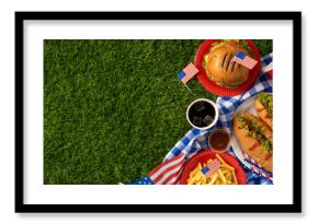 Labor Day and Independence Day celebration with American food, including hamburgers, hot dogs, fries, and flags, on a picnic setting representing patriotism