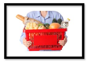 Woman holding red shopping basket with different fresh products on white background