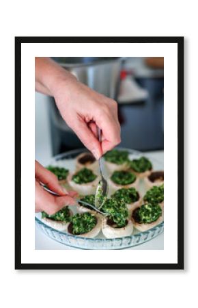 Stuffed mushrooms are prepared with spinach filling