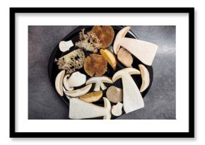 Slices of different types of edible mushrooms