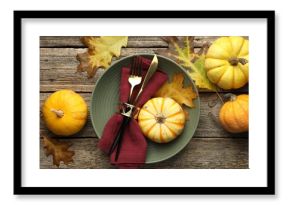 Beautiful table setting with autumn decor on wooden background, flat lay