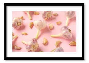 Fresh garlic on pink background
