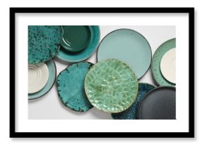 Set of green plates on white background