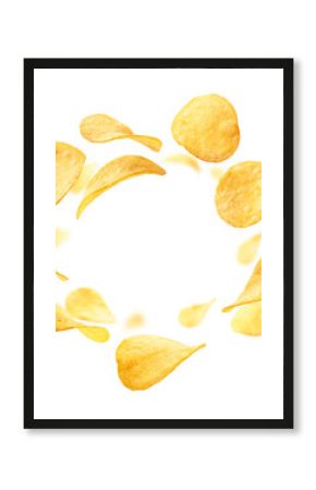 Potato chips levitate on a white background