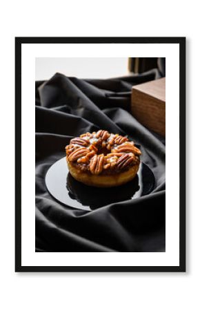 Artisanal Braided Donut on Black Cloth with Wooden Cube Accent