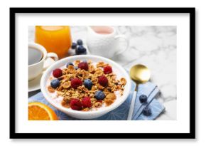 Tasty breakfast. Granola with yogurt and fruits served on white marble table, closeup