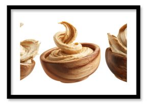 Swirled creamy hummus in wooden bowl, isolated on white transparent background. Concept of healthy vegan food and dip