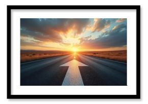 Road leads to sunset with white arrow painted forward. Open landscape with dry grass and cloudy sky. Journey towards bright future and success.