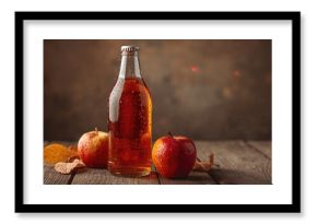 Close-up of apple cider on vintage wooden table, textured glass and natural setting, Earth Day