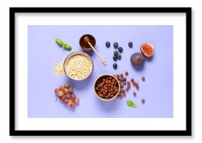 Tasty breakfast with oatmeal, corn balls and fruits on lilac background