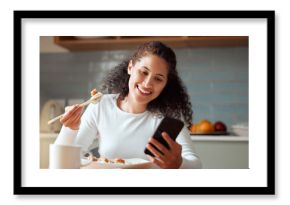 Happy, woman and phone with sushi in kitchen for nutrition, information and good review on website. Smile, chopsticks and female person with technology at home for healthy, meal and feedback on food