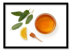 Herbal sage tea with lemon wedge and honey for refreshment and wellness